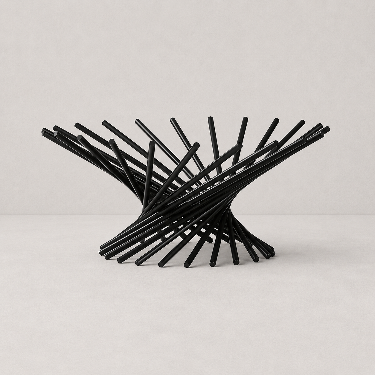 Black metal chair with a modern design on a light gray background