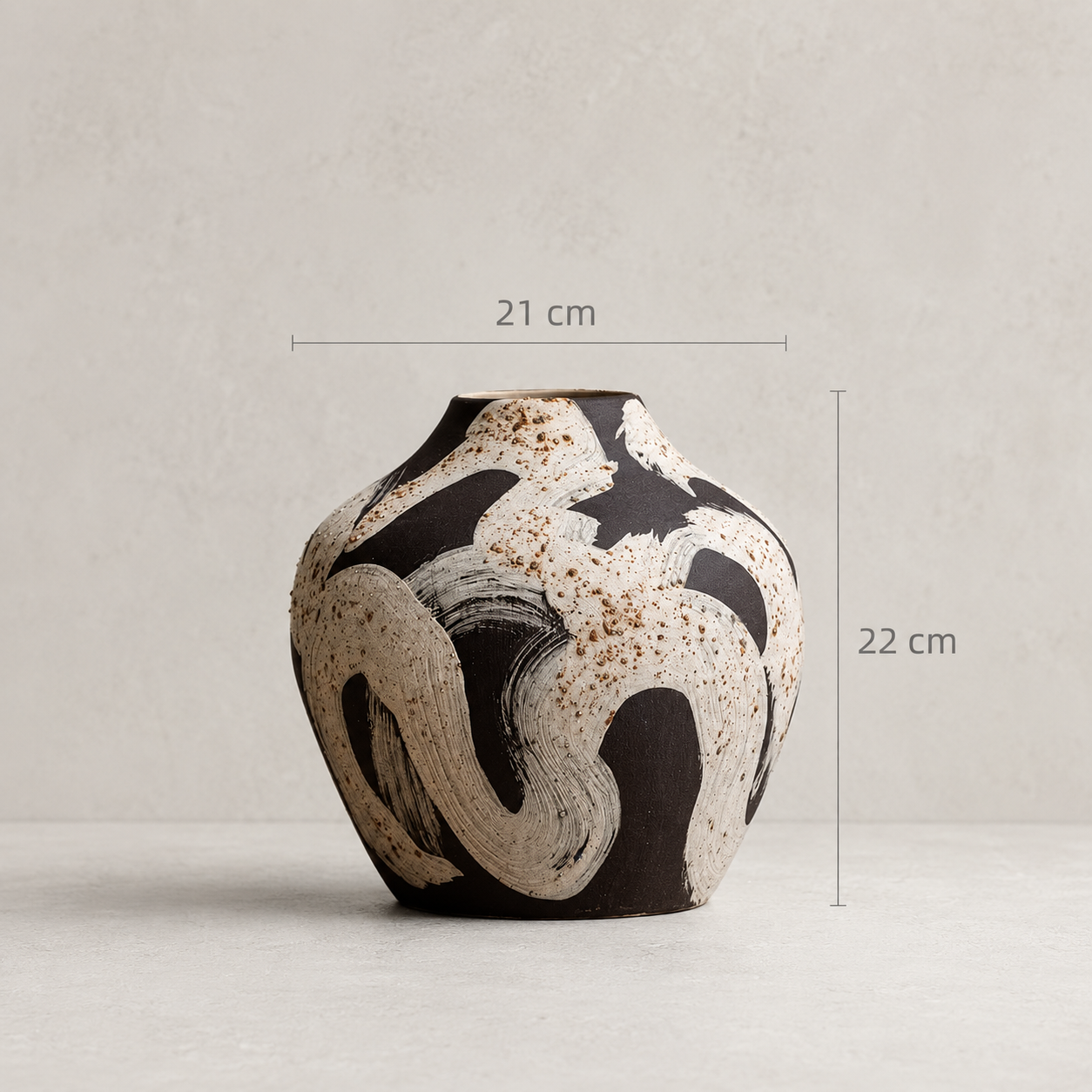 Ceramic vase with abstract design and measurements on a light background