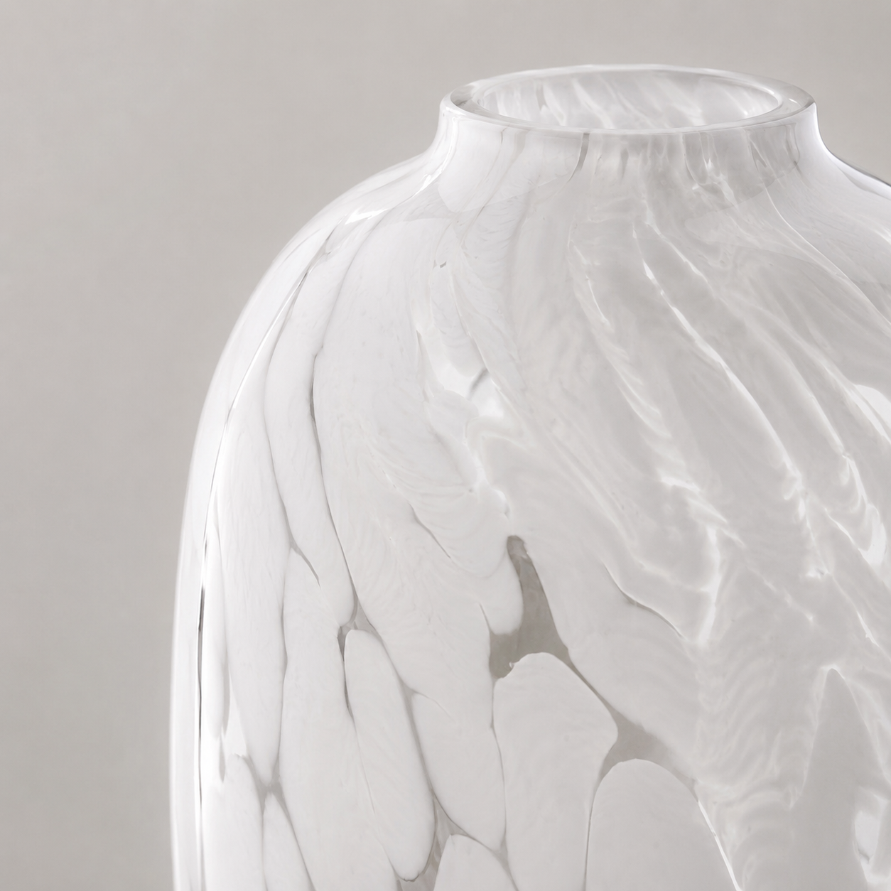 White marble-textured vase on a light gray background